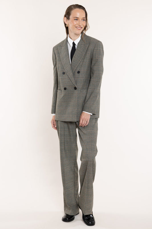 Checkered trousers in a moss green shade.