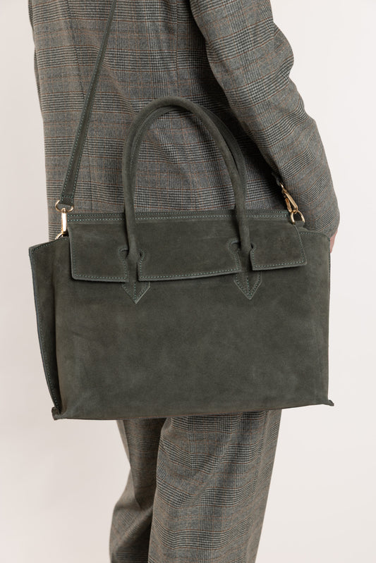 Suede bag in a moss green shade.