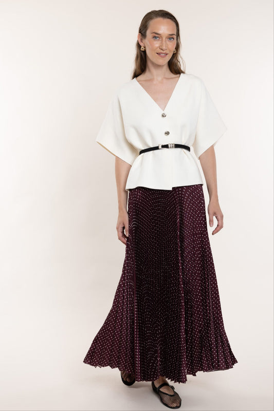 Pleated skirt with fine polka dots