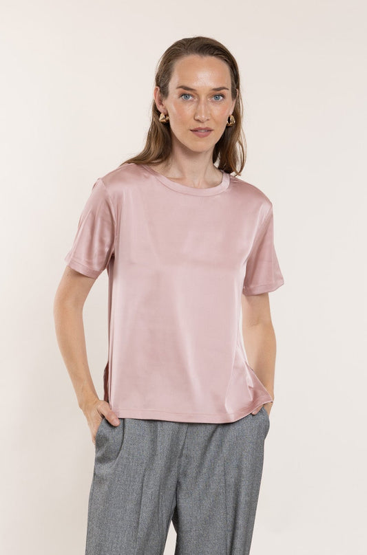Viscose T-shirt in peach color.