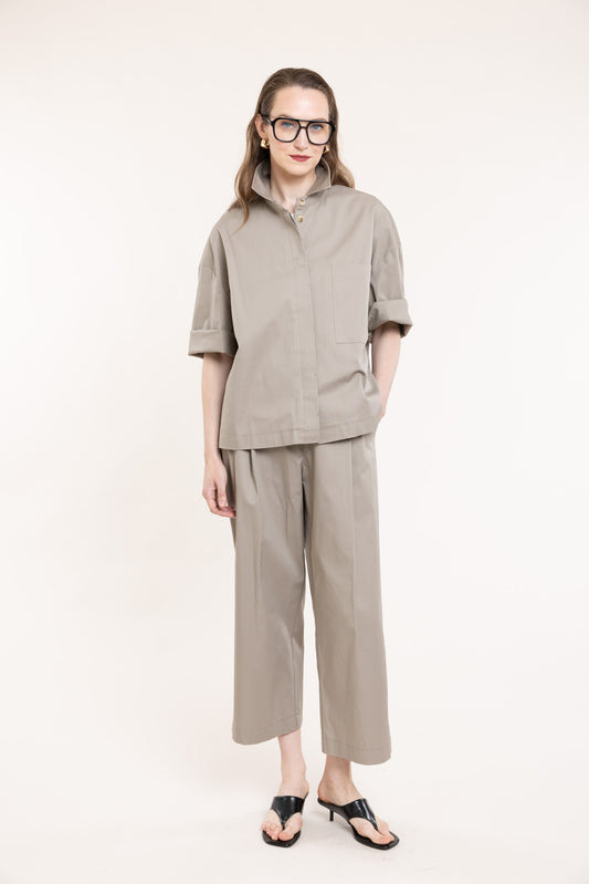 Beige pleated trousers