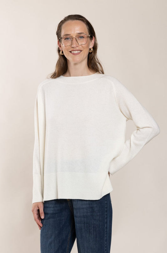 White sweater with straight sleeves