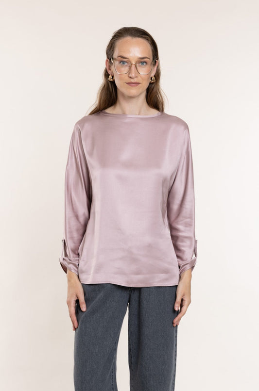 Viscose blouse in a soft pink shade.