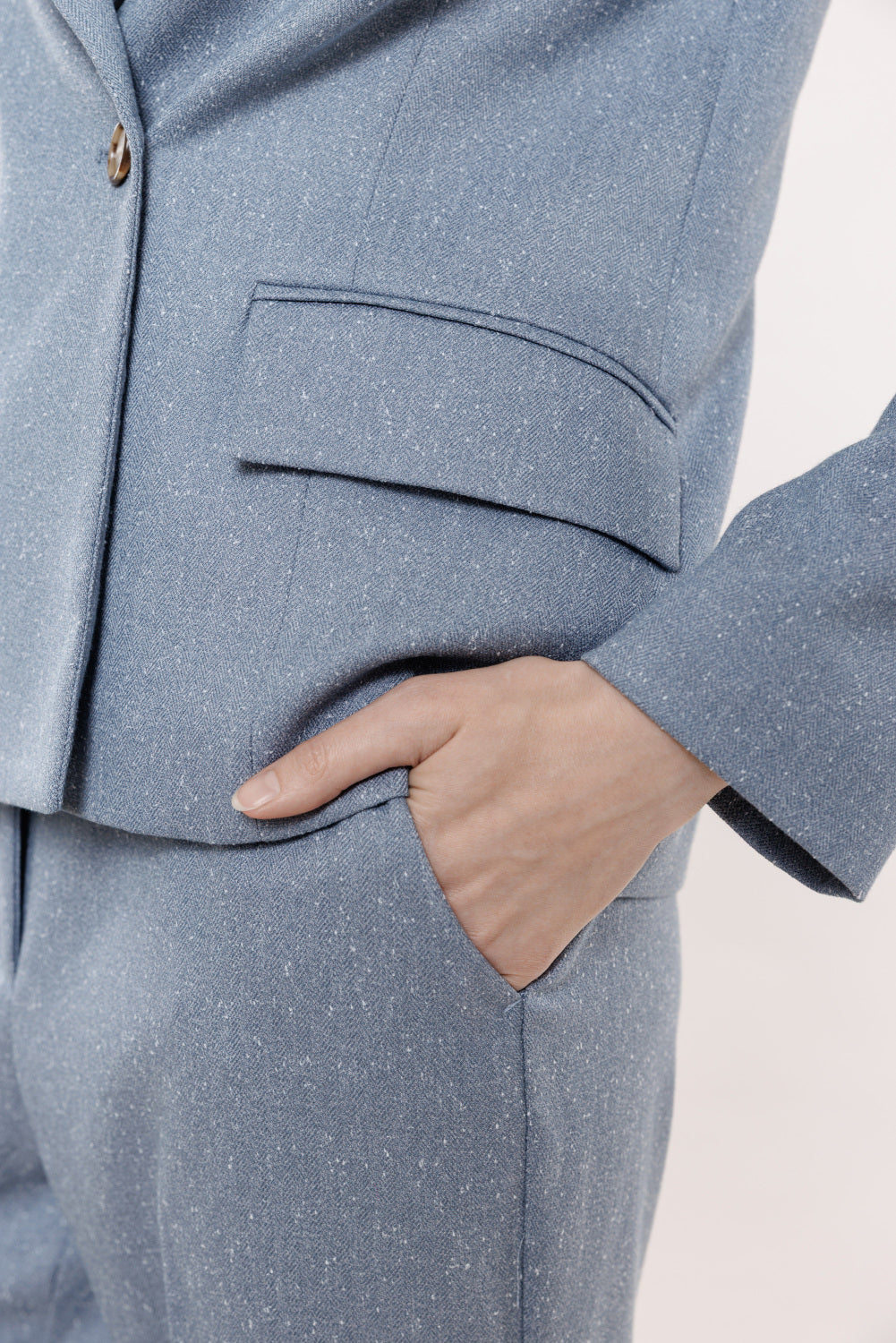 Light blue jacket with a subtle texture