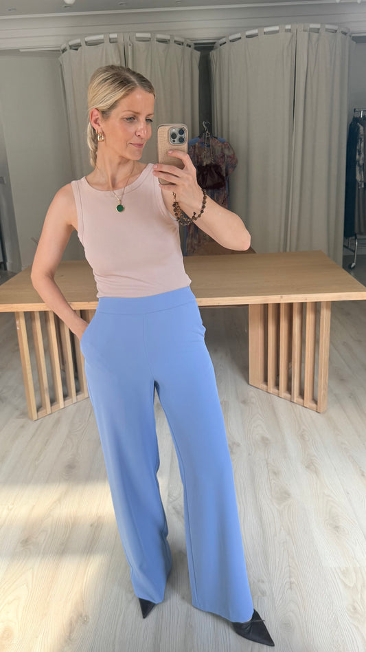 Light blue crepe trousers with elastic waistband