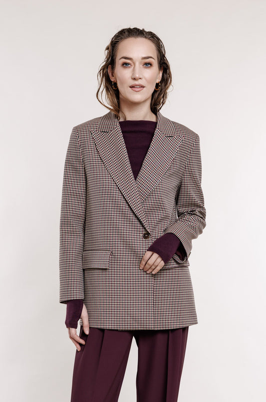 Rūtaina žakete ar asimetrisku aizdari