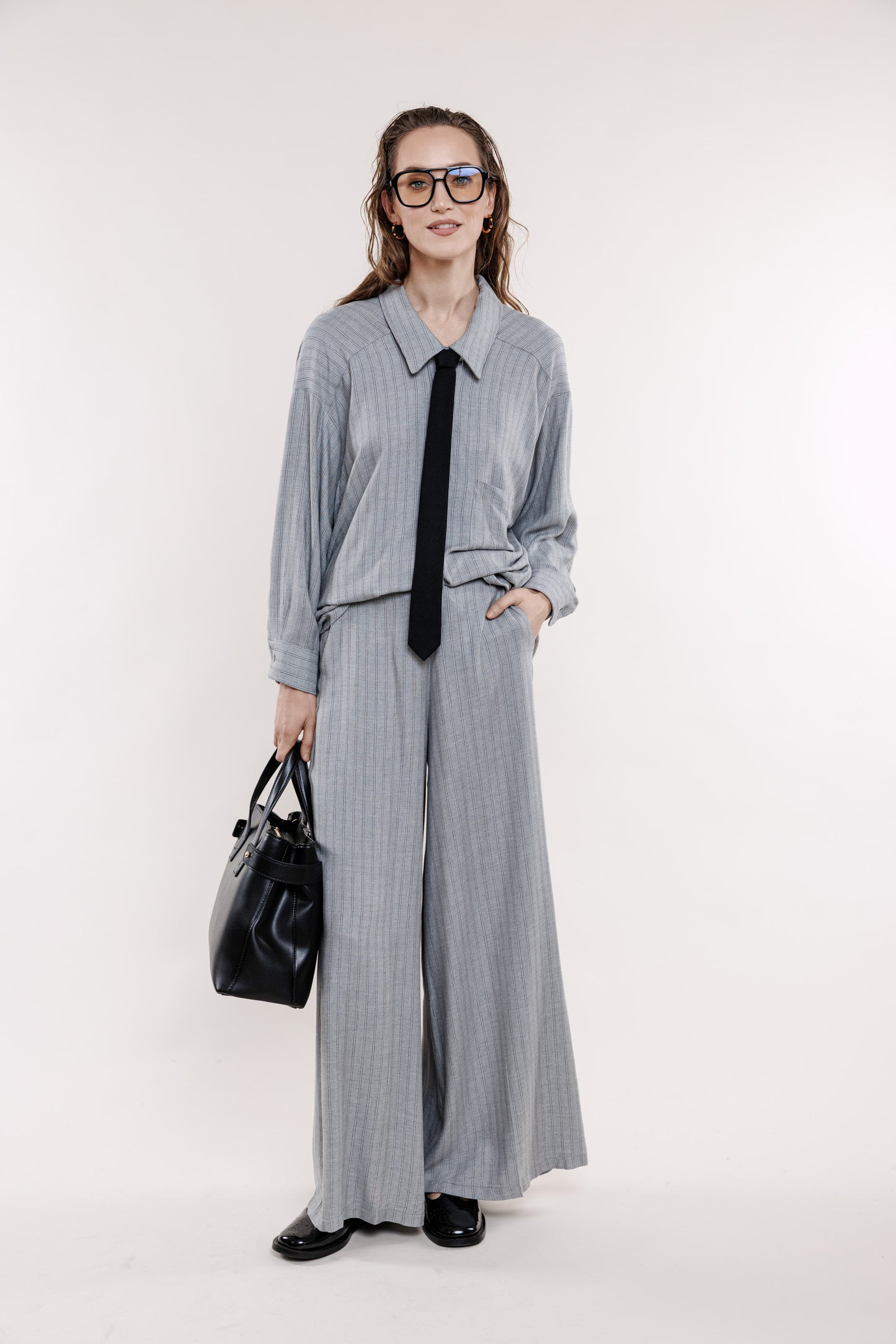 Grey striped trousers