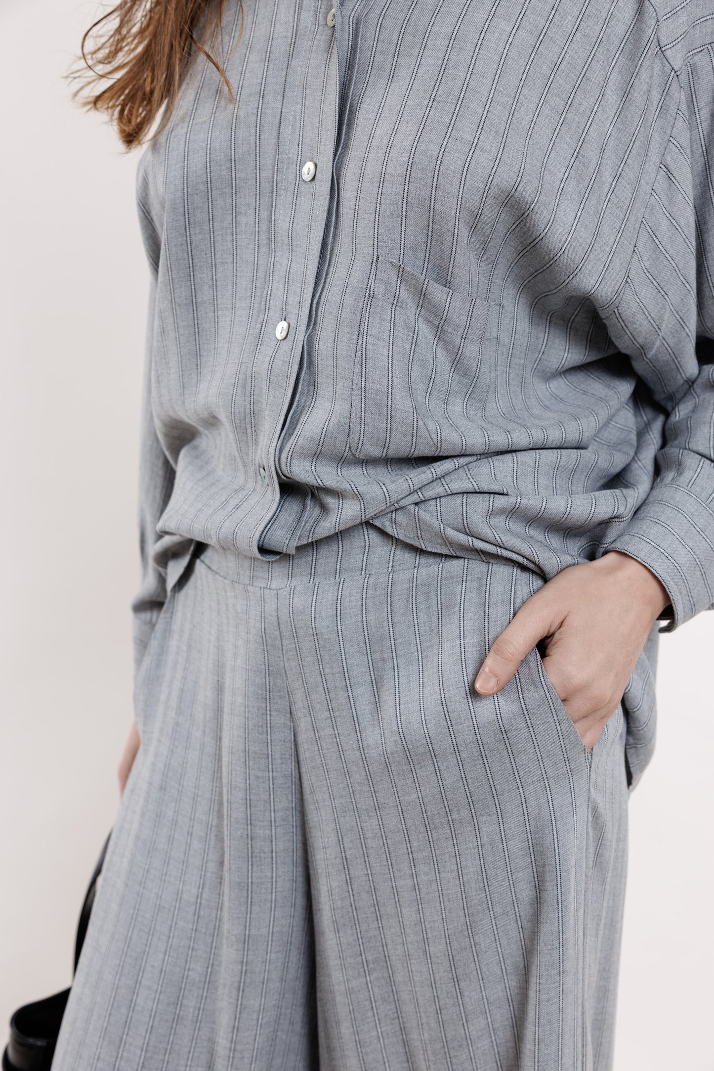 Grey striped trousers