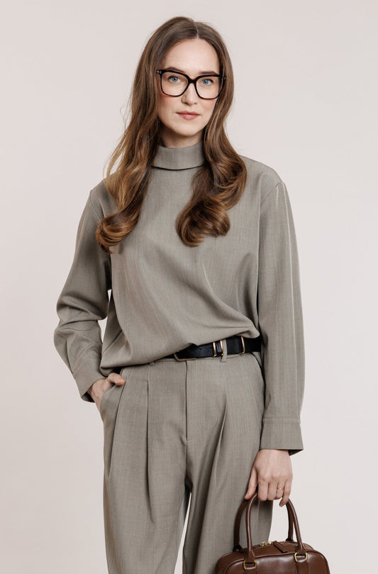 Elegants tops ar krādziņu