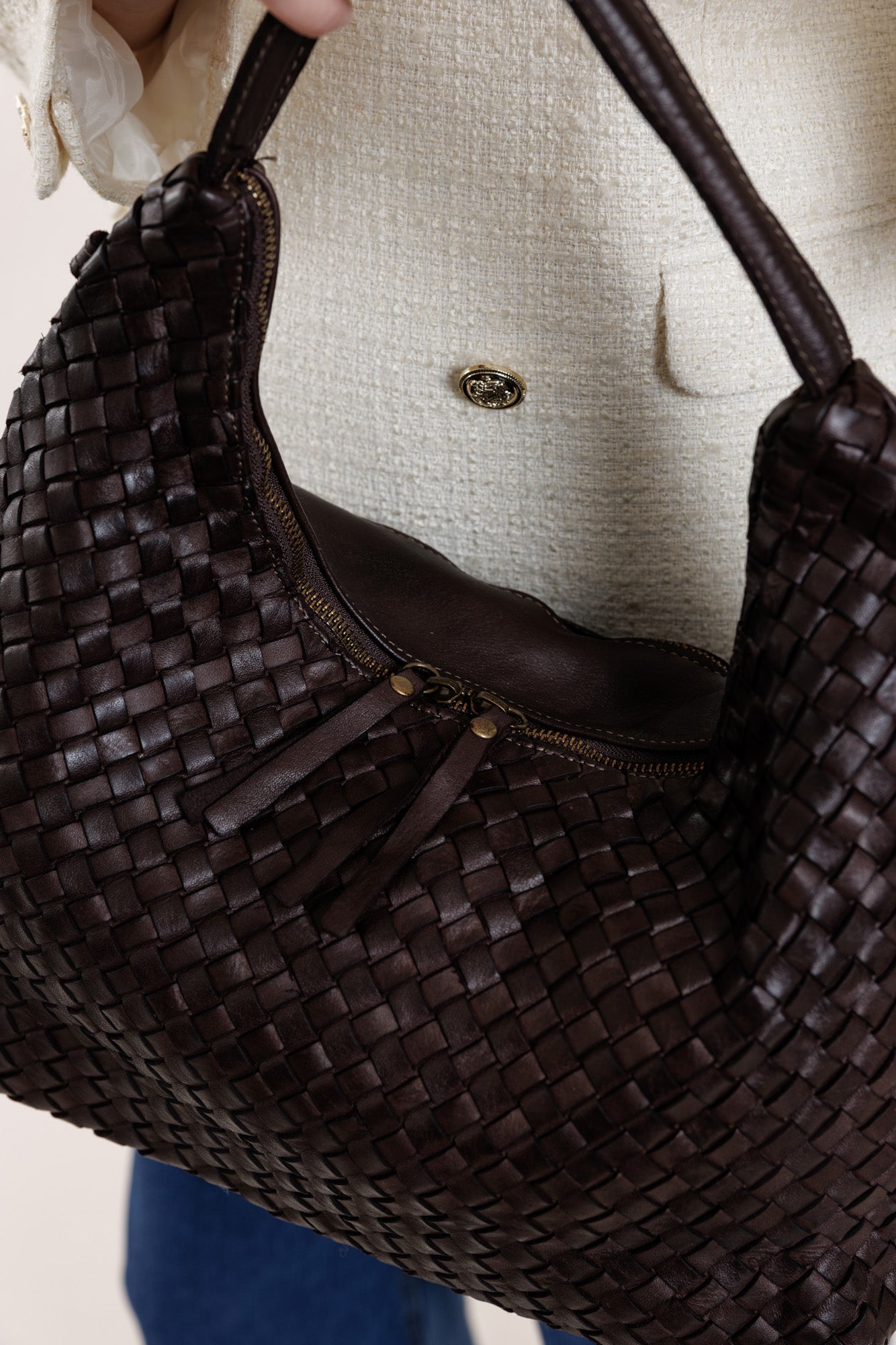 Brown bag with braided texture