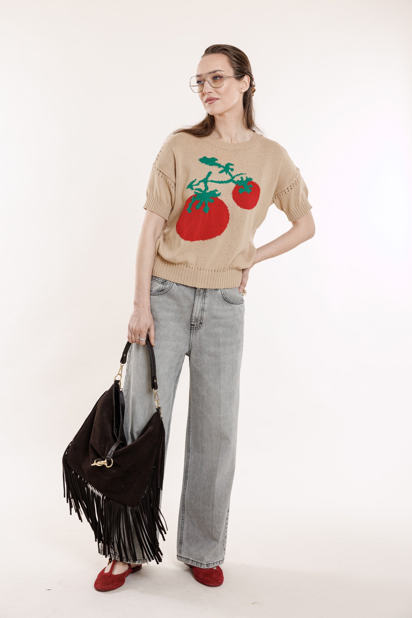 Brūnā zamšādas soma ar bārkstīm