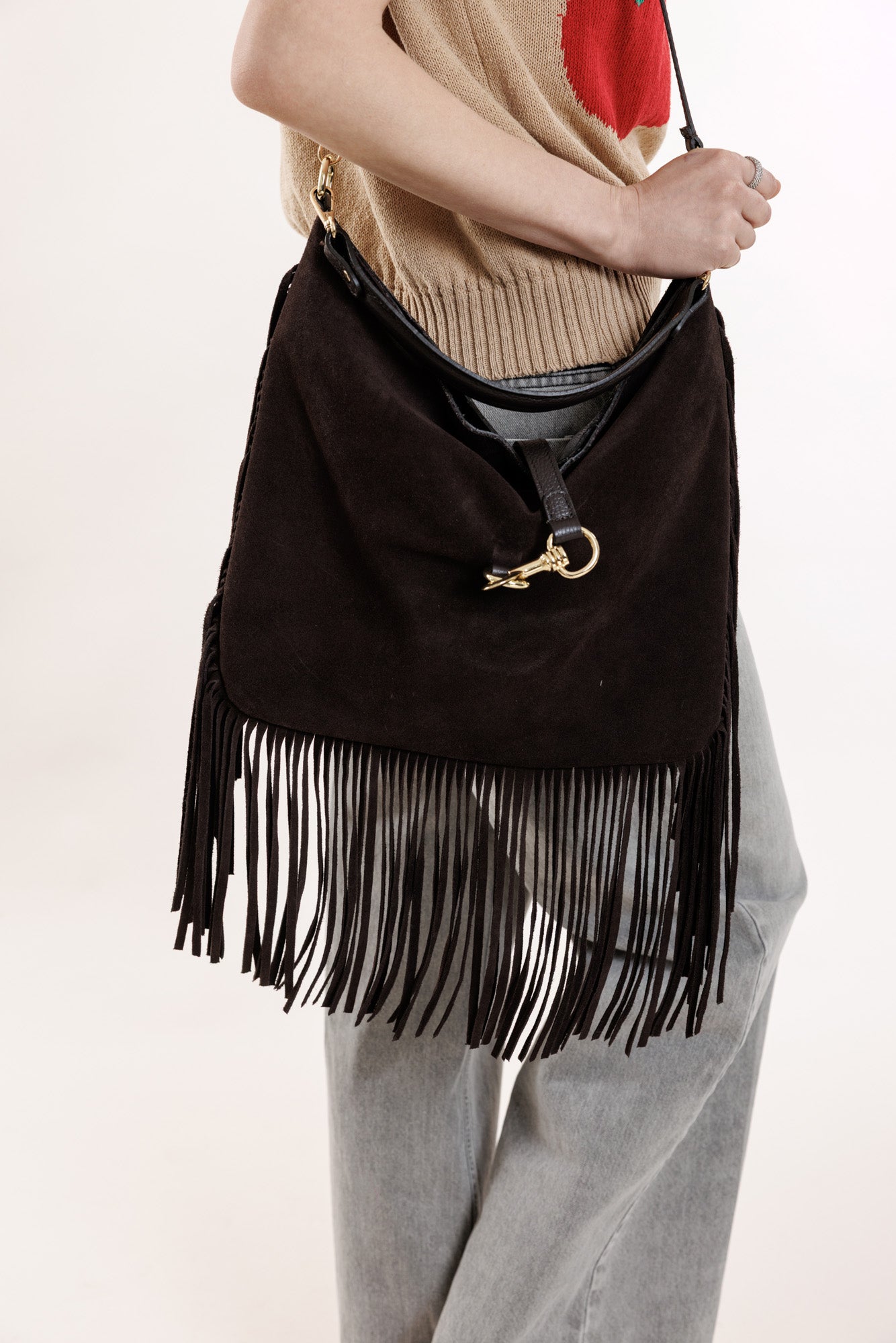 Brūnā zamšādas soma ar bārkstīm