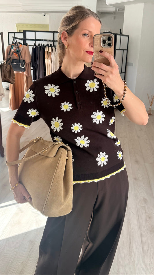 Polo ar margrietiņām